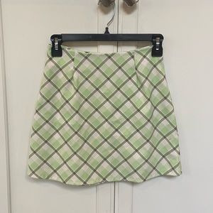 a green patterned skirt from alter’d state in a size small